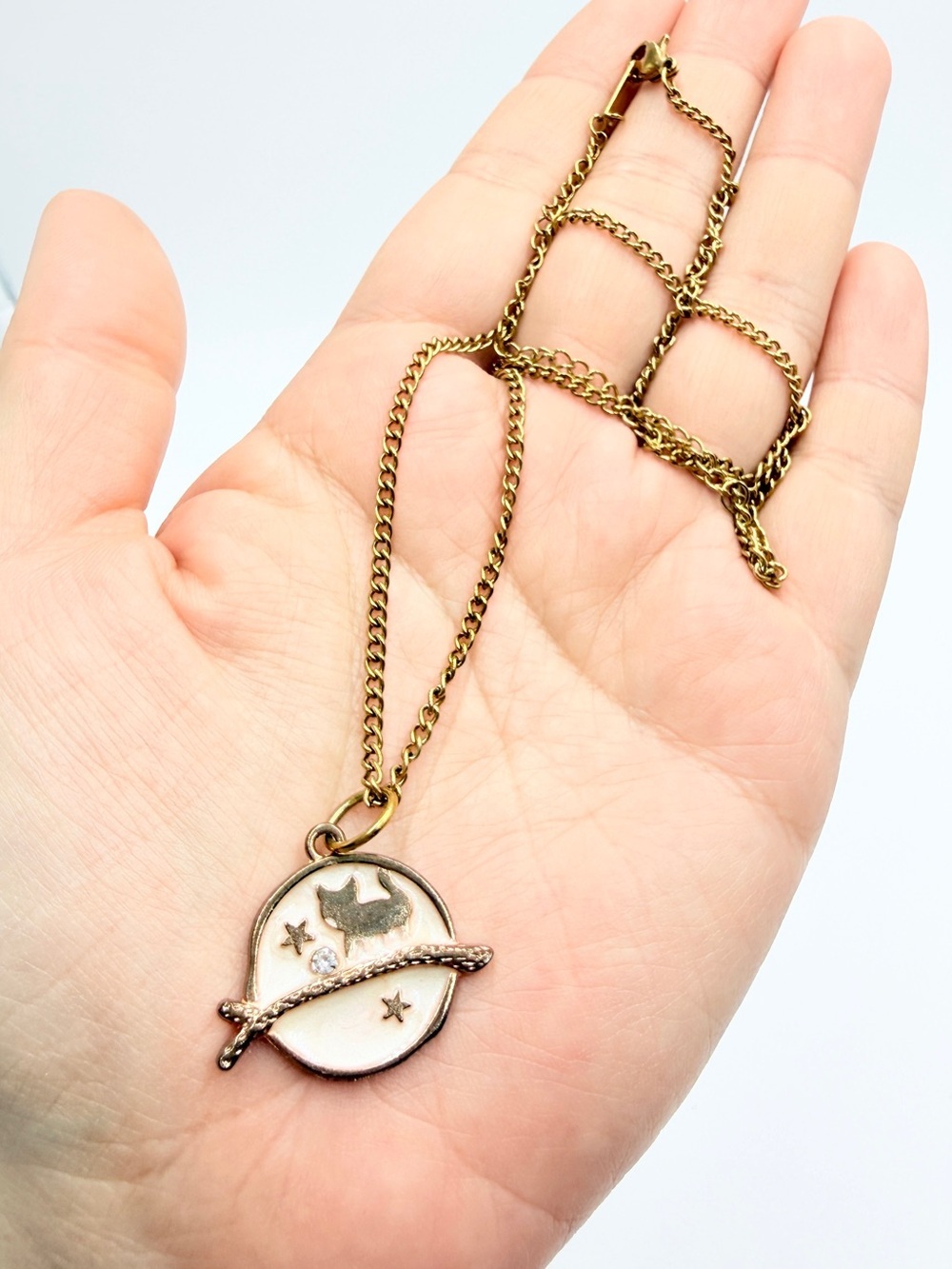Gold Tone Planet & Star Pendant Necklace with Crystal Accent